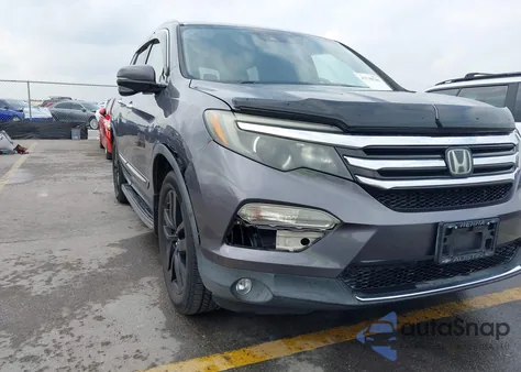 2016 Honda Pilot Touring z USA, uszkodzony, nr VIN 5FNYF6H95GB078356